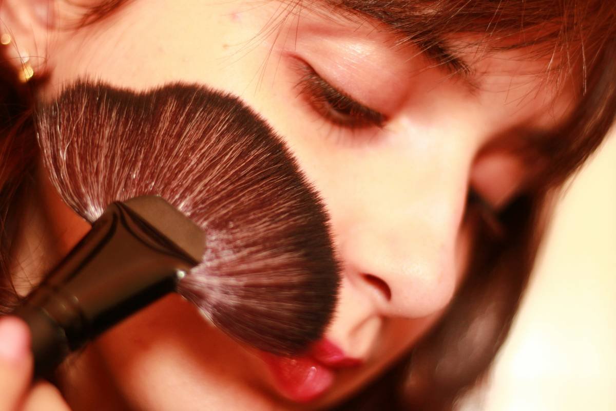 special event contouring on a model under studio lighting showing defined cheekbones and jawline